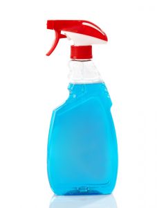 Botella de plástico de jabón líquido azul sobre el blanco
